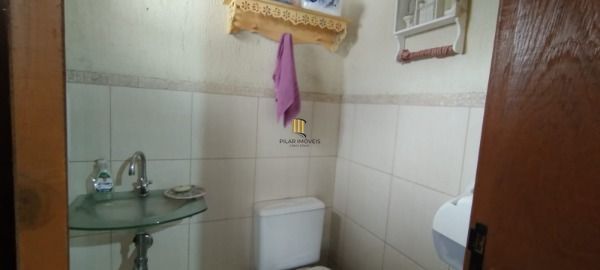 Casa 3 dormitórios no bairro Guarujá