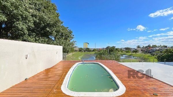 Casa Condominio em Porto Alegre, no bairro Hípica, com 3 dormitório(s), e 3 banheiros, à venda.