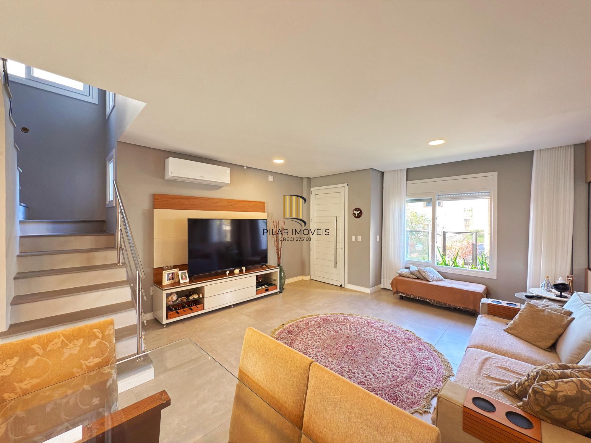 Casa moderna com 3 dormitórios com pátio grande e vista para o Rio Guaíba!