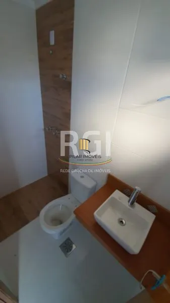 Casa 3 dormitórios no bairro Guarujá