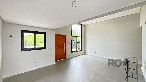 Casa em Porto Alegre, no bairro Hípica, com 3 dormitório(s), e 3 banheiros, à venda.
