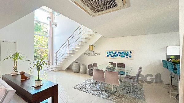 Casa Condominio em Porto Alegre, no bairro Hípica, com 3 dormitório(s), e 3 banheiros, à venda.