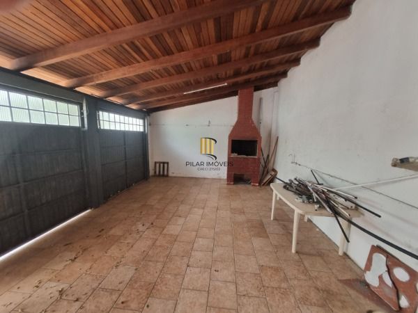 Casa 4 dormitórios no bairro Camaquã