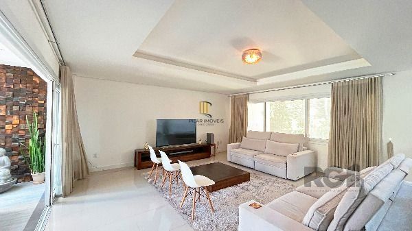 Casa Condominio em Porto Alegre, no bairro Hípica, com 3 dormitório(s), e 3 banheiros, à venda.