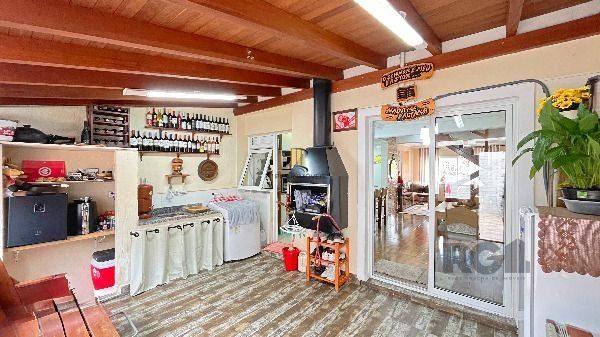 Casa Condominio em Porto Alegre, no bairro Hípica, com 3 dormitório(s), e 3 banheiros, à venda.