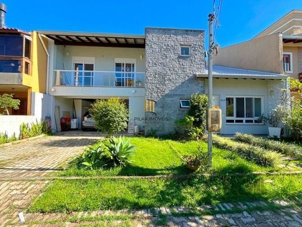 Casa em Porto Alegre, no bairro Hípica, com 3 dormitório(s), e 3 banheiros, à venda. - Pilar Imóveis