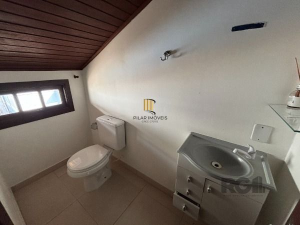 Casa Condominio em Porto Alegre, no bairro Vila Nova, com 3 dormitório(s), à venda.