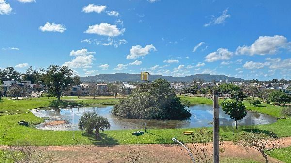 Casa em Porto Alegre, no bairro Hípica, com 3 dormitório(s), e 3 banheiros, à venda.