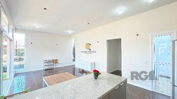 Casa Condominio em Porto Alegre, no bairro Hípica, com 3 dormitório(s), e 3 banheiros, à venda.