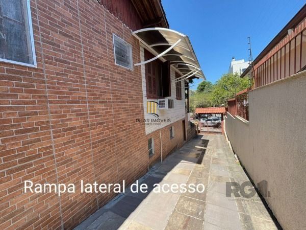 Casa 3 dormitórios no bairro Camaquã