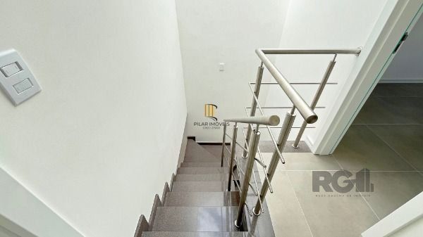 Casa Condominio em Porto Alegre, no bairro Campo Novo, com 3 dormitório(s), e 3 banheiros, à venda.