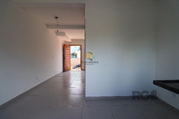 Casa Condominio em Porto Alegre, no bairro Vila Nova, com 2 dormitório(s), e 2 banheiros, à venda.