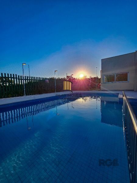 Casa Condominio em Porto Alegre, no bairro Hípica, com 3 dormitório(s), e 3 banheiros, à venda.