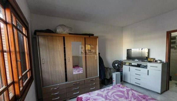 Casa em Porto Alegre, no bairro Cavalhada, com 5 dormitório(s), e 5 banheiros, à venda.