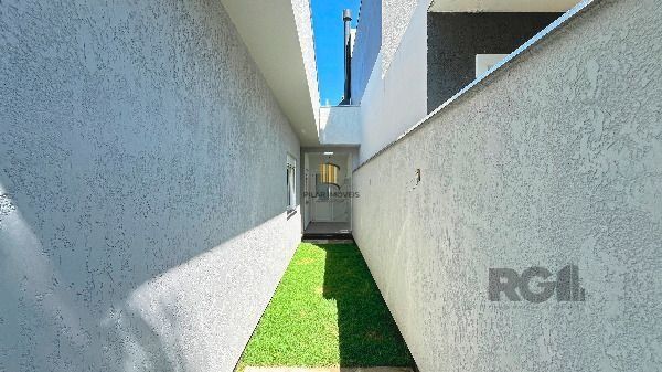 Casa Condominio em Porto Alegre, no bairro Hípica, com 3 dormitório(s), e 3 banheiros, à venda.