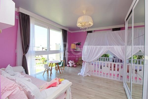 Casa Condominio em Porto Alegre, no bairro Hípica, com 3 dormitório(s), e 3 banheiros, à venda.
