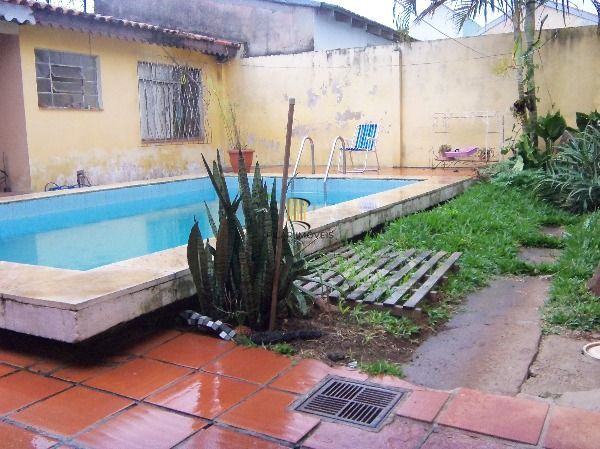 Casa para Venda - 275m², 4 dormitórios, 2 vagas - Guarujá