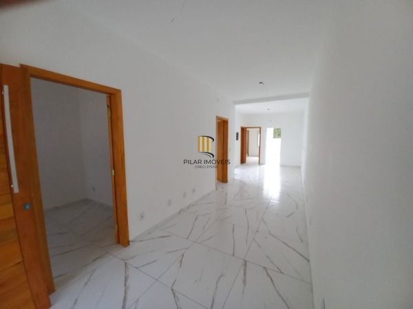 Casa em Porto Alegre, no bairro Belém Novo, com 3 dormitório(s), e 3 banheiros, à venda.