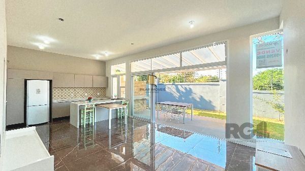 Casa Condominio em Porto Alegre, no bairro Hípica, com 3 dormitório(s), e 3 banheiros, à venda.