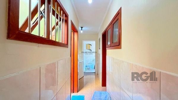 Sobrado 4 dormitórios no bairro Camaquã