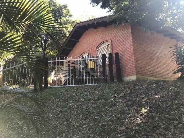 Sítio em Porto Alegre, no bairro Vila Nova, com 3 dormitório(s), à venda.