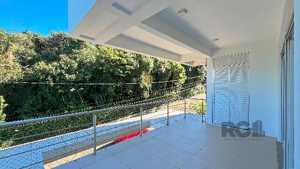 Casa Condominio em Porto Alegre, no bairro Hípica, com 3 dormitório(s), e 3 banheiros, à venda.