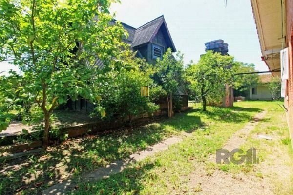 Casa em Porto Alegre, no bairro Ipanema, com 6 dormitório(s), à venda.