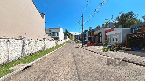 Casa Condominio em Porto Alegre, no bairro Hípica, com 3 dormitório(s), e 3 banheiros, à venda.