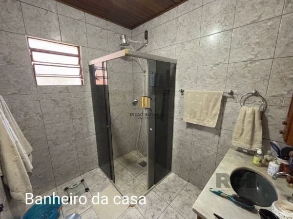 Casa 3 dormitórios no bairro Camaquã