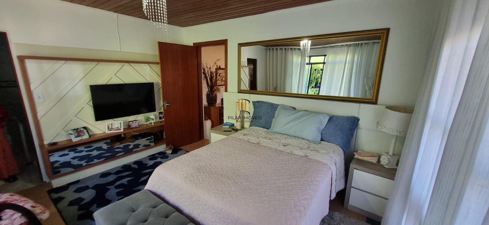 Casa com pavilhão