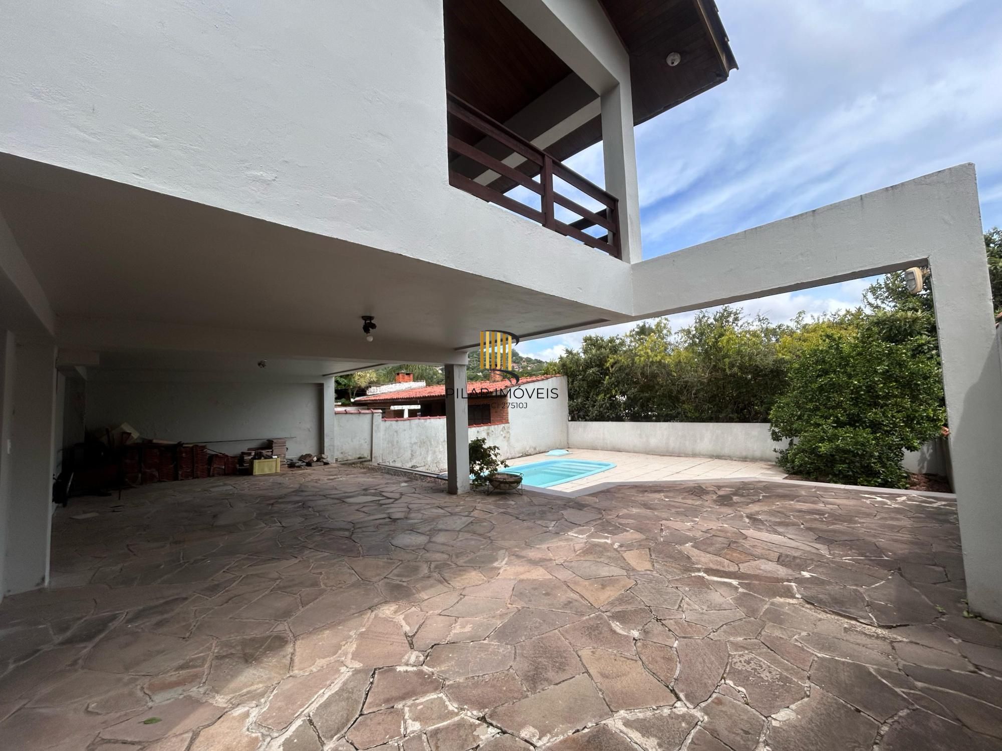 Casa 3 dormitórios no bairro Partenon