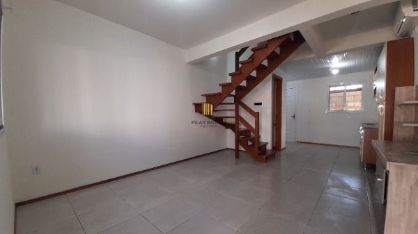 Casa Condominio em Porto Alegre, no bairro Restinga, com 2 dormitório(s), e 2 banheiros, à venda.