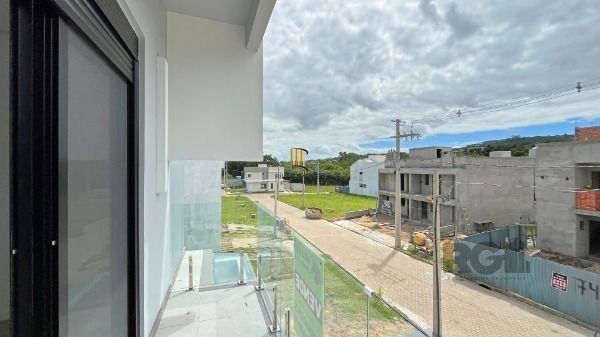 Casa Condominio em Porto Alegre, no bairro Campo Novo, com 3 dormitório(s), e 3 banheiros, à venda.