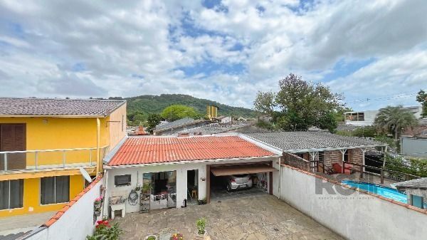 Casa em Porto Alegre, no bairro Aberta dos Morros, com 3 dormitório(s), à venda.