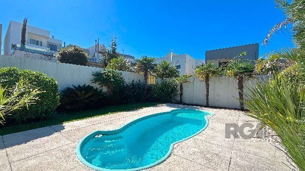 Casa Condominio em Porto Alegre, no bairro Hípica, com 3 dormitório(s), e 3 banheiros, à venda.