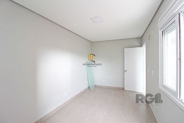 Casa Condominio em Porto Alegre, no bairro Hípica, com 3 dormitório(s), e 3 banheiros, à venda.