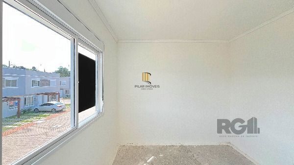Casa em Porto Alegre, no bairro Vila Nova, com 2 dormitório(s), e 2 banheiros, à venda.