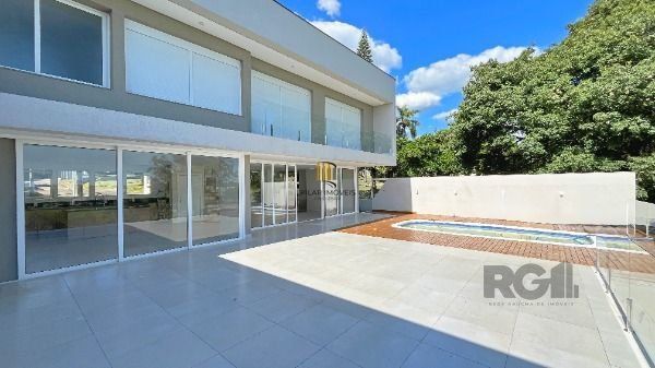 Casa Condominio em Porto Alegre, no bairro Hípica, com 3 dormitório(s), e 3 banheiros, à venda.