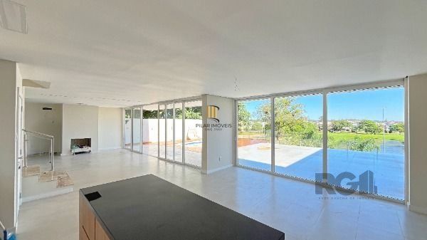 Casa Condominio em Porto Alegre, no bairro Hípica, com 3 dormitório(s), e 3 banheiros, à venda.