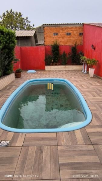 Casa em Porto Alegre, no bairro Hípica, com 3 dormitório(s), e 3 banheiros, à venda.