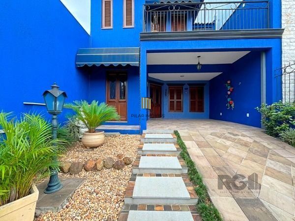Casa em Porto Alegre, no bairro Hípica, com 3 dormitório(s), e 3 banheiros, à venda.