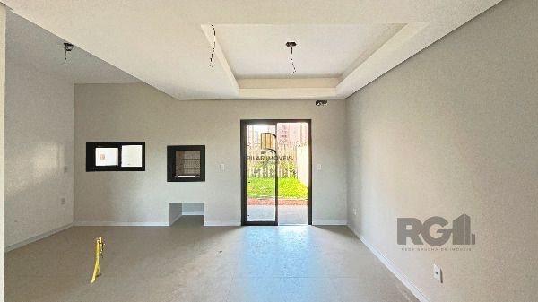 Casa em Porto Alegre, no bairro Hípica, com 3 dormitório(s), e 3 banheiros, à venda.