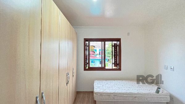 Casa em Porto Alegre, no bairro Hípica, com 3 dormitório(s), e 3 banheiros, à venda.