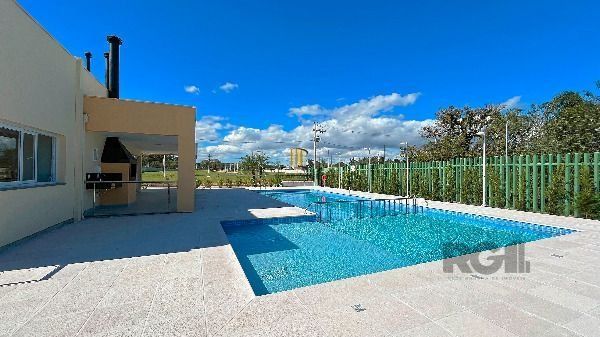 Casa Condominio em Porto Alegre, no bairro Hípica, com 3 dormitório(s), e 3 banheiros, à venda.