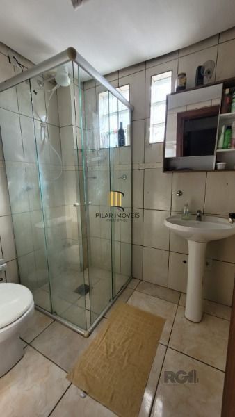 Casa Condominio em Porto Alegre, no bairro Hípica, com 2 dormitório(s), e 2 banheiros, à venda.