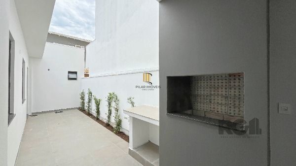 Casa em Porto Alegre, no bairro Hípica, com 3 dormitório(s), e 3 banheiros, à venda.