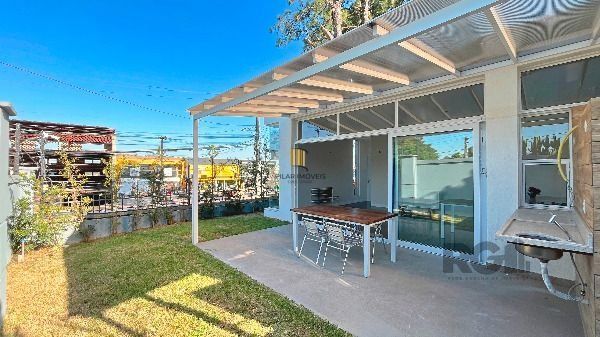 Casa Condominio em Porto Alegre, no bairro Hípica, com 3 dormitório(s), e 3 banheiros, à venda.