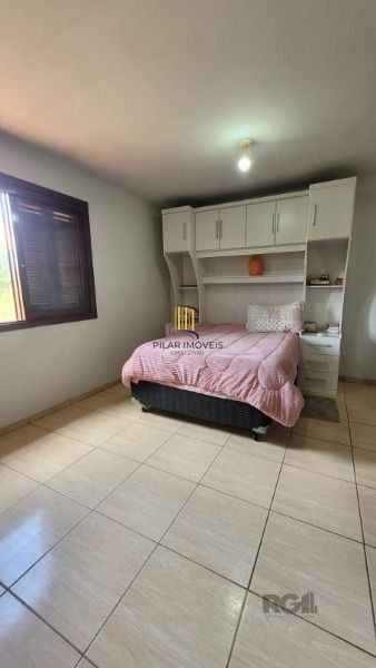 Casa Condominio em Porto Alegre, no bairro Hípica, com 2 dormitório(s), e 2 banheiros, à venda.