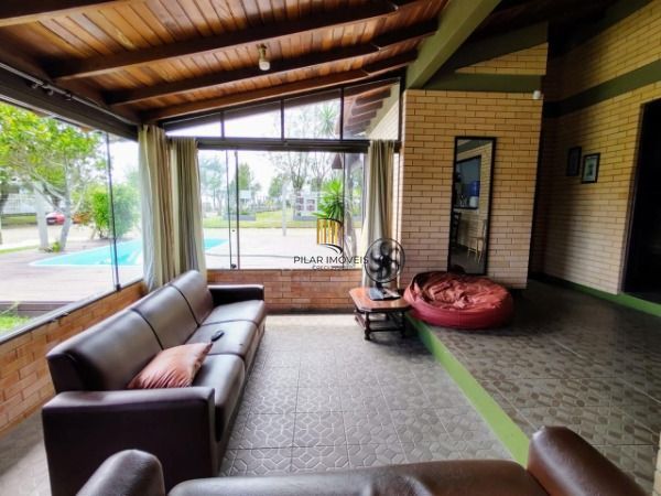 Casa 5 dormitórios no bairro Zona Norte