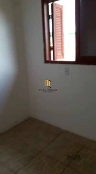 Casa em Porto Alegre, no bairro Hípica, com 2 dormitório(s), e 2 banheiros, à venda.